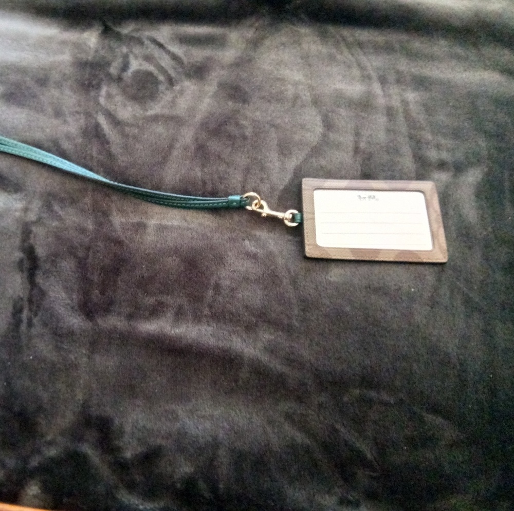 Brand new coach lanyard never used it